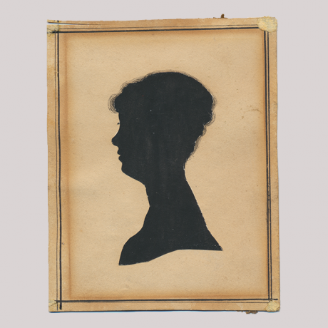 
        Front of silhouette, with woman looking left, in square painted frame.